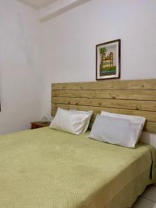 A bed or beds in a room at Casa Araújo