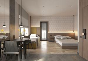 a bedroom with two beds and a table and a dining room at FULL HOUSE apart hotel in Rivne