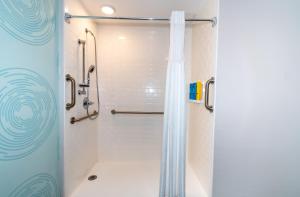 a shower with a glass door in a bathroom at Tru By Hilton Florida City, Fl in Florida City