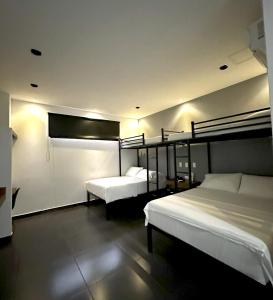 Hotel Cartagena DC客房内的一张或多张床位