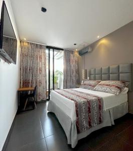 Hotel Cartagena DC客房内的一张或多张床位