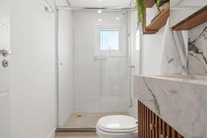 Koupelna v ubytování Solar da Garibaldi 3 Suítes by Achei Gramado + 44 fotografií