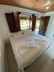 Cama ou camas em um quarto em Eco Pousada Mentawai