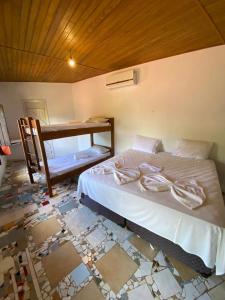 Cama ou camas em um quarto em Eco Pousada Mentawai