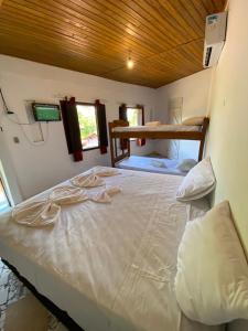 Cama ou camas em um quarto em Eco Pousada Mentawai