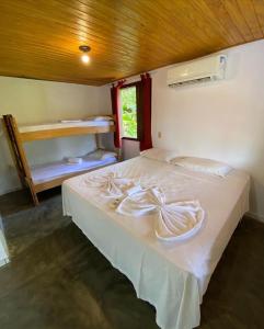 Cama ou camas em um quarto em Eco Pousada Mentawai