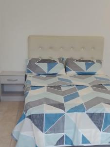 Кровать или кровати в номере San Pablo Neuquen
