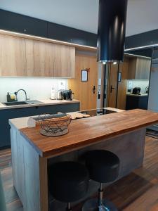 Kuchyňa alebo kuchynka v ubytovaní Apartament Madlen Kalinowa Szczyrk Sauna Grota Solna
