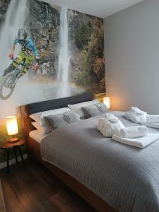 Posteľ alebo postele v izbe v ubytovaní Apartament Madlen Kalinowa Szczyrk Sauna Grota Solna