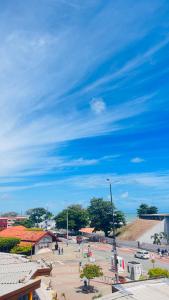 a view of a parking lot with a blue sky at Flat Tambaú - Beira-mar in João Pessoa