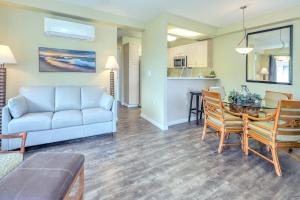a living room with a couch and a table at Ko Olina Fairways #4E townhouse in Kapolei +24 photos