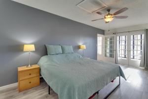 a bedroom with a bed and a ceiling fan at Convenient Colorado Horse Farm Apt with Balcony! in Aurora
