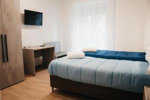 Postel nebo postele na pokoji v ubytování Winning Apartments