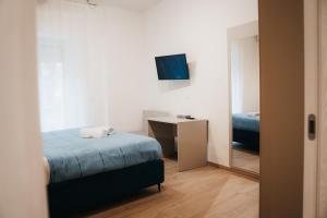 Postel nebo postele na pokoji v ubytování Winning Apartments