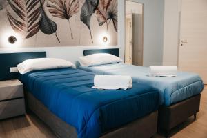 Postel nebo postele na pokoji v ubytování Winning Apartments