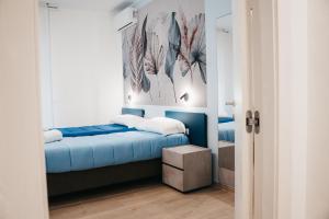 Postel nebo postele na pokoji v ubytování Winning Apartments