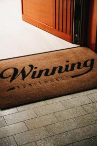 Certifikát, hodnocení, plakát nebo jiný dokument vystavený v ubytování Winning Apartments