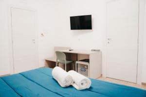 TV a/nebo společenská místnost v ubytování Winning Apartments