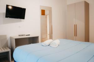 Postel nebo postele na pokoji v ubytování Winning Apartments