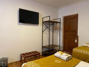 Cama ou camas em um quarto em Katari at Plaza de Armas Cusco