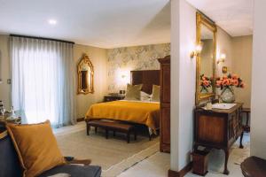 The Bohemian Guesthouse客房内的一张或多张床位