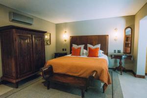The Bohemian Guesthouse客房内的一张或多张床位
