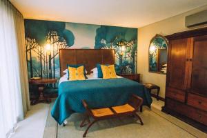 The Bohemian Guesthouse客房内的一张或多张床位