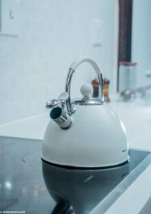 a toaster sitting on top of a counter at La Casa De Made-Luxury Apartment-No loadshedding in Sandton