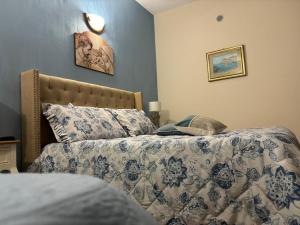 Łóżko lub łóżka w pokoju w obiekcie La Scala di Atena