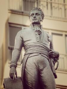 a statue of a man standing in front of a building at B&B Lieven Bauwens in Ghent
