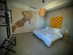 Voodi või voodid majutusasutuse 1 Corcega Beachfront Suites toas