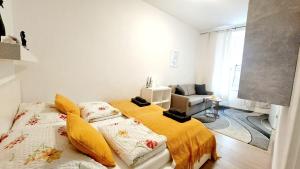 Posteľ alebo postele v izbe v ubytovaní CheckInVienna-One bedroom Apartment + 12 fotografií