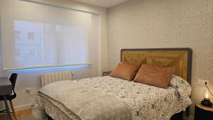 En eller flere senge i et værelse på Aires de Pontevedra + 30 billeder