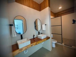 Vannituba majutusasutuses 1 Corcega Beachfront Suites