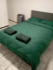 Postel nebo postele na pokoji v ubytování PENSIUNE Sweet Touch + 2 fotografie