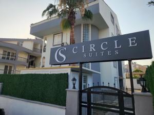 a sign that reads g circle suites in front of a building at Side Circle Suites in Side