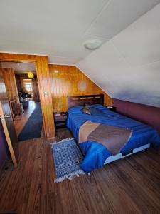 Tempat tidur dalam kamar di hospedaje