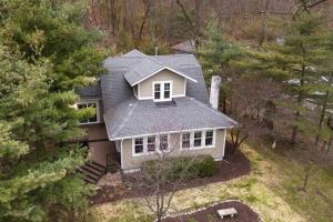 an aerial view of a house in the woods at Riverside Retreat! in West Lafayette