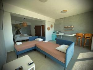 Voodi või voodid majutusasutuse 1 Corcega Beachfront Suites toas