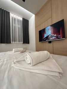 Ένα ή περισσότερα κρεβάτια σε δωμάτιο στο Apartman Pahulja 402 - Zlatni Javor +11 φωτογραφίες