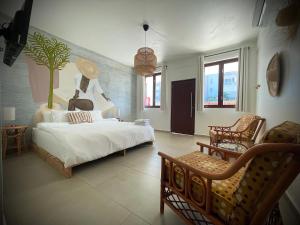 Voodi või voodid majutusasutuse 1 Corcega Beachfront Suites toas