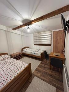 Postel nebo postele na pokoji v ubytování Domaćinstvo Marić