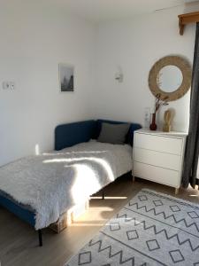 Postel nebo postele na pokoji v ubytování Nada Apartman