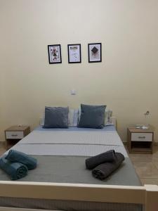 Ένα ή περισσότερα κρεβάτια σε δωμάτιο στο Good Dreams Apartment