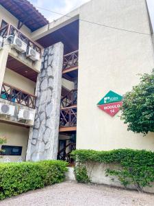 a sign on the side of a building at Hotel Fazenda Monte Castelo Flat Gravatá in Bezerros