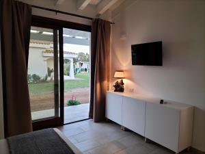 TV a/nebo společenská místnost v ubytování B&B Briosa + 32 fotografií