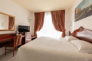 Postel nebo postele na pokoji v ubytování Noventa Hotel + 37 fotografií