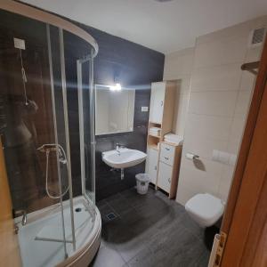Koupelna v ubytování Apartment U345 - Aparthotel Vučko Jahorina