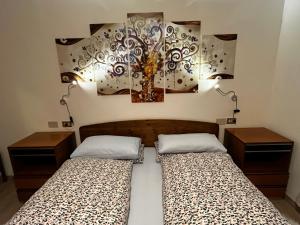 Кровать или кровати в номере My Dolomites Home