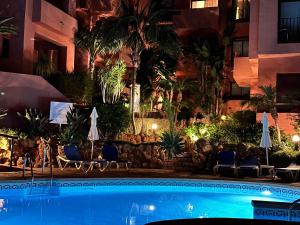 The swimming pool at or close to XPCE D CARLOS GARDENS Apartment